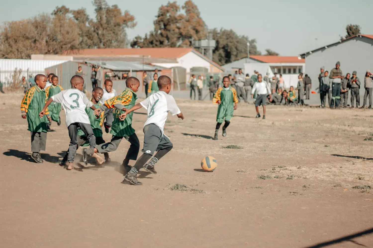 Children playing football in South Africa